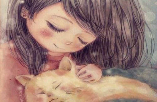 طفلة تحتضن قطة